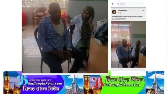 ফোনে কথা বলে এক হাত দিয়ে করোনা ভ্যাকসিন দিলেন এক সেবিকা 